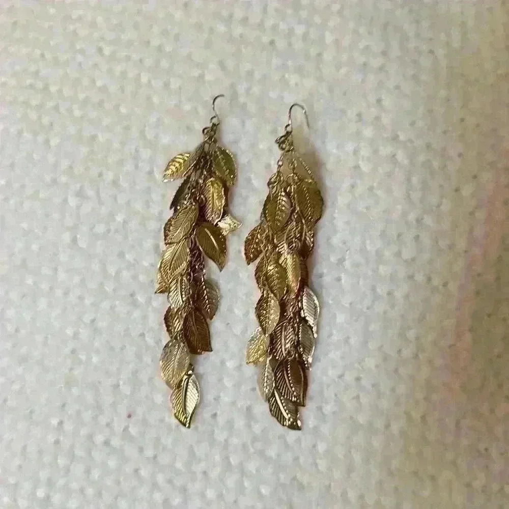 Gold colored handing earrings